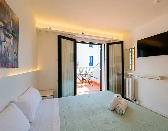 Habitació Doble amb terrassa i vista lateral al mar