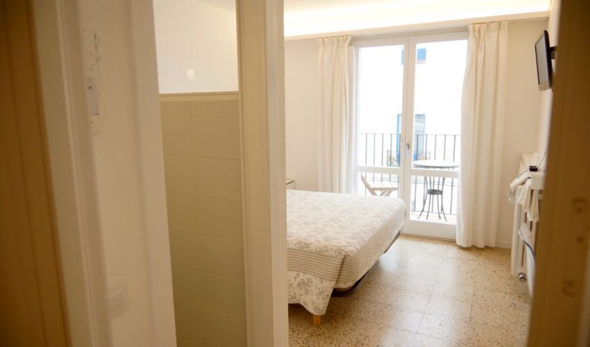 Room with balcony and side sea view